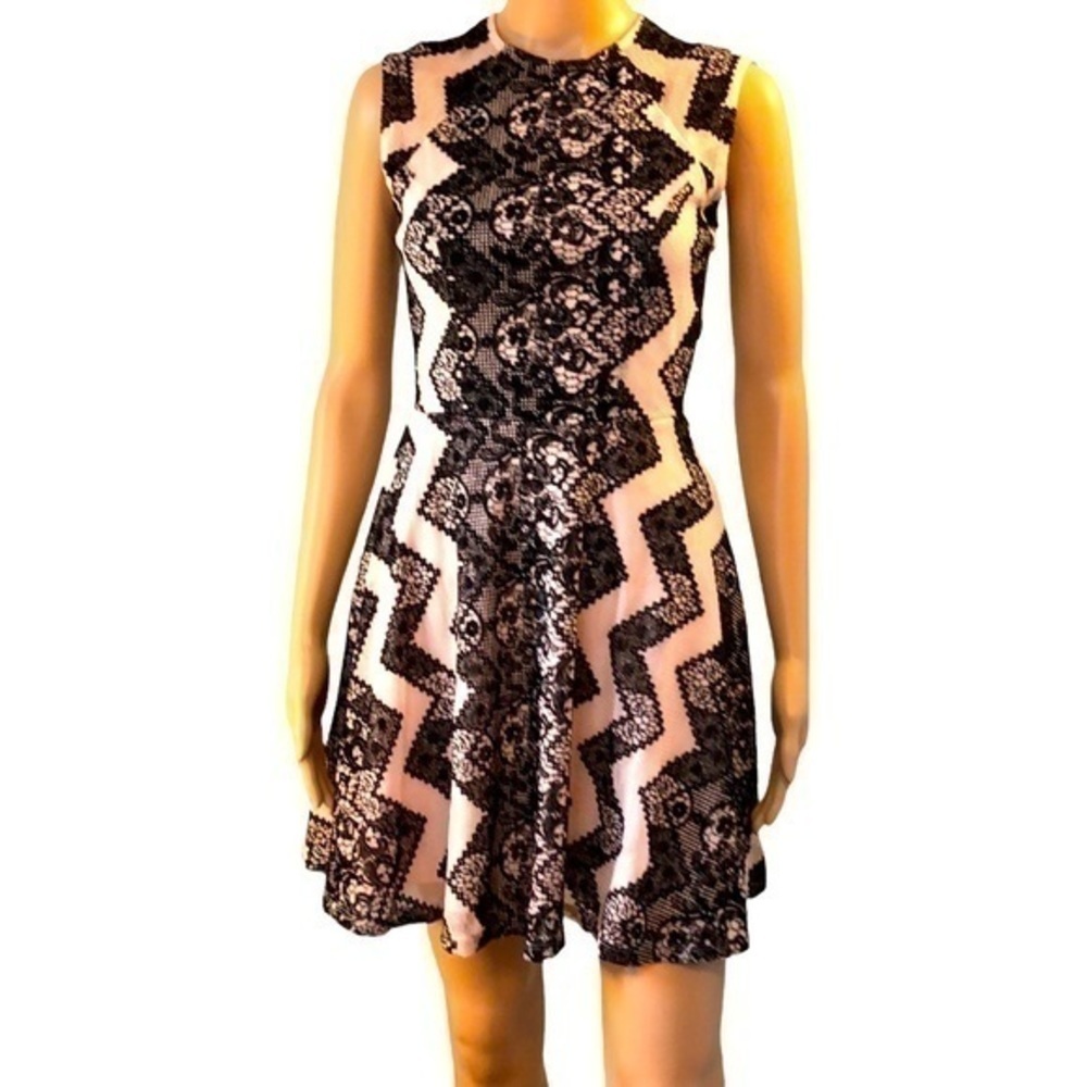 Love Fire dress size light blush pink overlay with black floral embroidery.​​